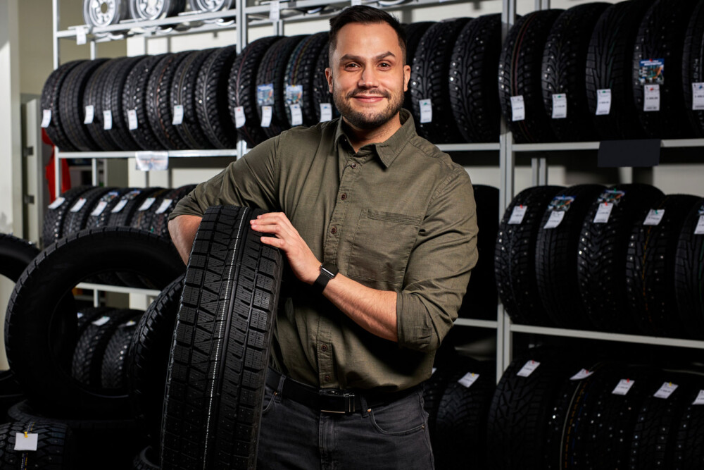 man in business casual shirt smiling